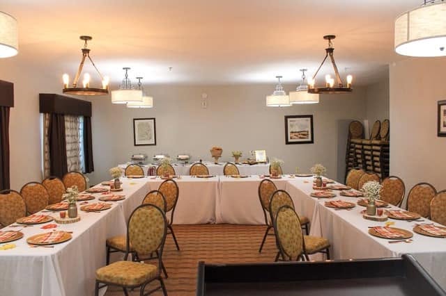 A retreat dining room set for a group meal